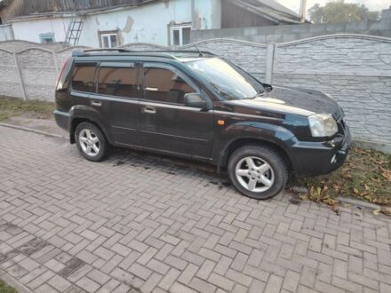 Ніссан ІксТрейл 2004 у Луцьку на Automoto.ua Чорний Ніссан ІксТрейл, об'ємом двигуна 2 л та пробігом 216 тис. км за 5000 $, фото 1 на Automoto.ua