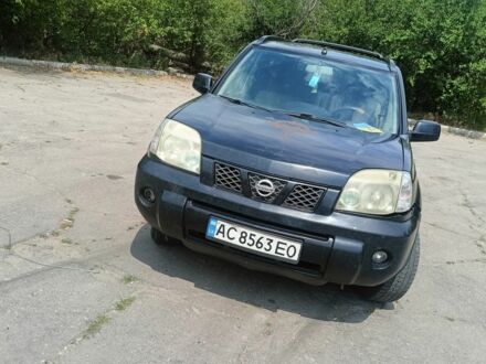 Черный Ниссан ИксТрейл, объемом двигателя 2.2 л и пробегом 338 тыс. км за 2900 $, фото 1 на Automoto.ua