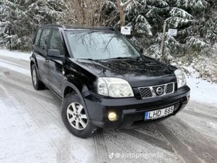 Черный Ниссан ИксТрейл, объемом двигателя 2.2 л и пробегом 237 тыс. км за 2235 $, фото 1 на Automoto.ua