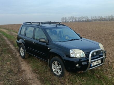 Черный Ниссан ИксТрейл, объемом двигателя 2.2 л и пробегом 294 тыс. км за 5000 $, фото 1 на Automoto.ua