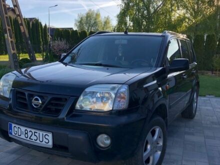 Черный Ниссан ИксТрейл, объемом двигателя 2.2 л и пробегом 266 тыс. км за 2200 $, фото 1 на Automoto.ua