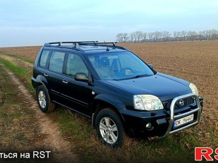 Черный Ниссан ИксТрейл, объемом двигателя 2.2 л и пробегом 294 тыс. км за 5000 $, фото 1 на Automoto.ua