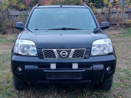 Черный Ниссан ИксТрейл, объемом двигателя 2.2 л и пробегом 260 тыс. км за 3000 $, фото 1 на Automoto.ua