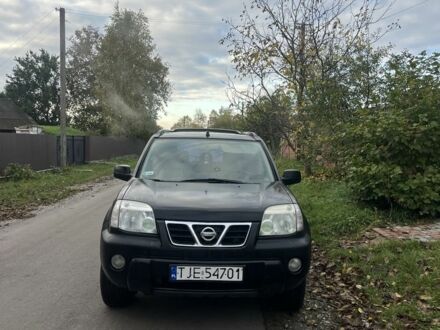 Черный Ниссан ИксТрейл, объемом двигателя 2.2 л и пробегом 327 тыс. км за 3600 $, фото 1 на Automoto.ua