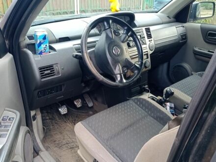 Черный Ниссан ИксТрейл, объемом двигателя 0 л и пробегом 200 тыс. км за 4000 $, фото 1 на Automoto.ua