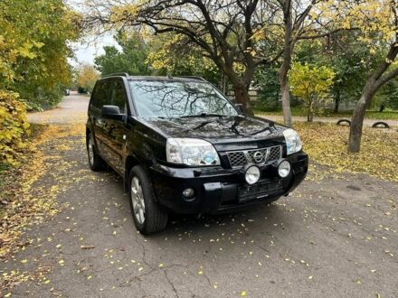 Черный Ниссан ИксТрейл, объемом двигателя 2.2 л и пробегом 270 тыс. км за 3800 $, фото 1 на Automoto.ua