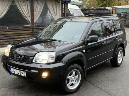 Черный Ниссан ИксТрейл, объемом двигателя 2.2 л и пробегом 226 тыс. км за 3650 $, фото 1 на Automoto.ua