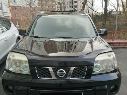 Черный Ниссан ИксТрейл, объемом двигателя 2.5 л и пробегом 261 тыс. км за 8300 $, фото 1 на Automoto.ua