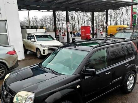 Черный Ниссан ИксТрейл, объемом двигателя 2.2 л и пробегом 100 тыс. км за 5500 $, фото 1 на Automoto.ua