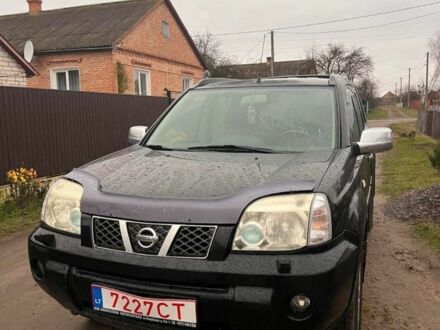 Черный Ниссан ИксТрейл, объемом двигателя 2.2 л и пробегом 270 тыс. км за 3900 $, фото 1 на Automoto.ua