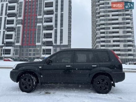 Черный Ниссан ИксТрейл, объемом двигателя 2 л и пробегом 196 тыс. км за 7100 $, фото 1 на Automoto.ua