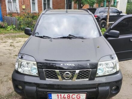 Чорний Ніссан ІксТрейл, об'ємом двигуна 0 л та пробігом 228 тис. км за 5500 $, фото 1 на Automoto.ua