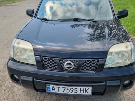 Черный Ниссан ИксТрейл, объемом двигателя 2.18 л и пробегом 210 тыс. км за 6400 $, фото 1 на Automoto.ua