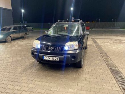 Черный Ниссан ИксТрейл, объемом двигателя 2 л и пробегом 270 тыс. км за 3700 $, фото 1 на Automoto.ua