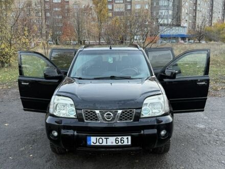 Черный Ниссан ИксТрейл, объемом двигателя 2.2 л и пробегом 306 тыс. км за 3800 $, фото 1 на Automoto.ua