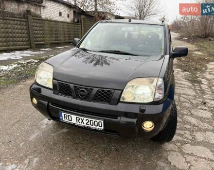 Черный Ниссан ИксТрейл, объемом двигателя 2.2 л и пробегом 251 тыс. км за 3850 $, фото 1 на Automoto.ua