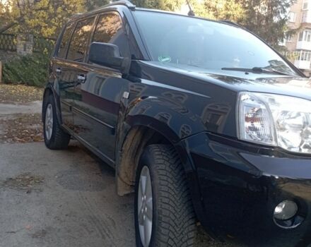 Черный Ниссан ИксТрейл, объемом двигателя 2 л и пробегом 196 тыс. км за 4300 $, фото 1 на Automoto.ua