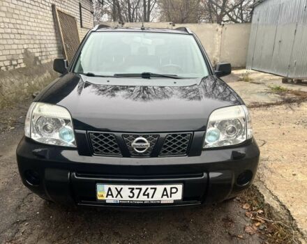 Черный Ниссан ИксТрейл, объемом двигателя 2 л и пробегом 150 тыс. км за 7700 $, фото 1 на Automoto.ua
