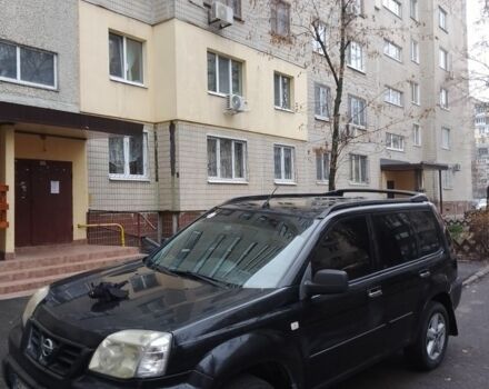 Черный Ниссан ИксТрейл, объемом двигателя 2.2 л и пробегом 260 тыс. км за 4500 $, фото 1 на Automoto.ua