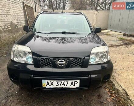 Черный Ниссан ИксТрейл, объемом двигателя 2 л и пробегом 150 тыс. км за 6500 $, фото 1 на Automoto.ua