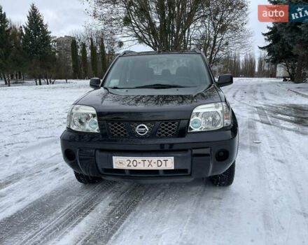 Черный Ниссан ИксТрейл, объемом двигателя 2 л и пробегом 190 тыс. км за 7200 $, фото 1 на Automoto.ua