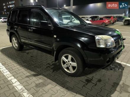 Черный Ниссан ИксТрейл, объемом двигателя 2.49 л и пробегом 128 тыс. км за 7500 $, фото 1 на Automoto.ua