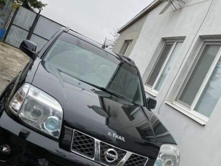 Черный Ниссан ИксТрейл, объемом двигателя 2 л и пробегом 300 тыс. км за 7000 $, фото 1 на Automoto.ua