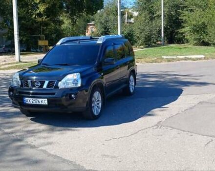Чорний Ніссан ІксТрейл, об'ємом двигуна 2.49 л та пробігом 210 тис. км за 9250 $, фото 1 на Automoto.ua