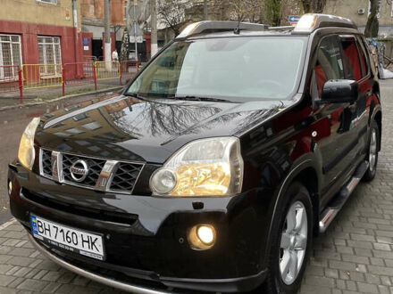Черный Ниссан ИксТрейл, объемом двигателя 2 л и пробегом 193 тыс. км за 8700 $, фото 1 на Automoto.ua