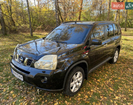 Черный Ниссан ИксТрейл, объемом двигателя 2 л и пробегом 214 тыс. км за 11500 $, фото 1 на Automoto.ua