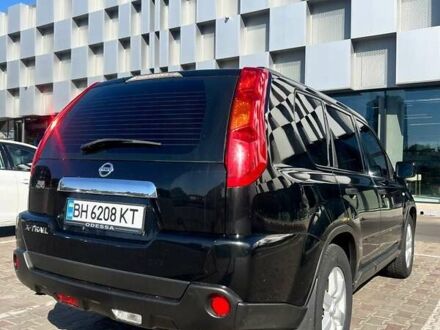Черный Ниссан ИксТрейл, объемом двигателя 2 л и пробегом 190 тыс. км за 8700 $, фото 1 на Automoto.ua