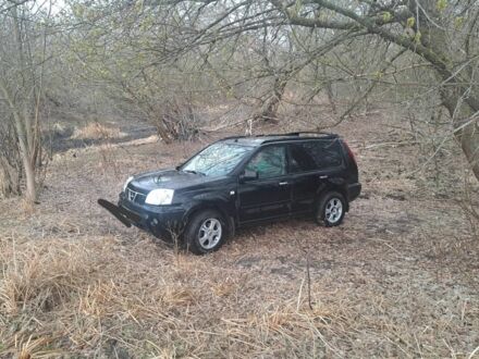 Чорний Ніссан ІксТрейл, об'ємом двигуна 2.2 л та пробігом 290 тис. км за 4500 $, фото 1 на Automoto.ua