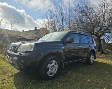 Черный Ниссан ИксТрейл, объемом двигателя 2.2 л и пробегом 206 тыс. км за 4000 $, фото 1 на Automoto.ua