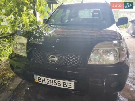 Черный Ниссан ИксТрейл, объемом двигателя 2.49 л и пробегом 195 тыс. км за 5200 $, фото 1 на Automoto.ua