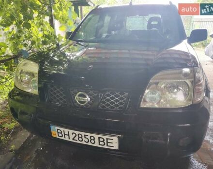 Черный Ниссан ИксТрейл, объемом двигателя 2.49 л и пробегом 195 тыс. км за 5200 $, фото 1 на Automoto.ua