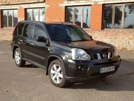 Черный Ниссан ИксТрейл, объемом двигателя 2 л и пробегом 240 тыс. км за 9700 $, фото 1 на Automoto.ua