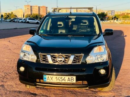 Чорний Ніссан ІксТрейл, об'ємом двигуна 2.5 л та пробігом 223 тис. км за 9172 $, фото 1 на Automoto.ua
