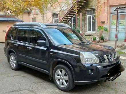 Черный Ниссан ИксТрейл, объемом двигателя 25 л и пробегом 213 тыс. км за 9725 $, фото 1 на Automoto.ua