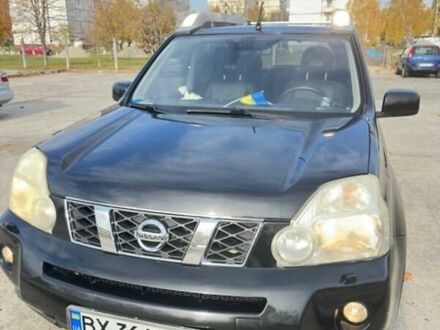 Черный Ниссан ИксТрейл, объемом двигателя 2 л и пробегом 220 тыс. км за 10500 $, фото 1 на Automoto.ua