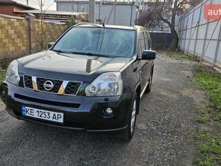 Черный Ниссан ИксТрейл, объемом двигателя 2 л и пробегом 230 тыс. км за 9000 $, фото 1 на Automoto.ua