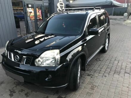 Черный Ниссан ИксТрейл, объемом двигателя 2 л и пробегом 160 тыс. км за 9400 $, фото 1 на Automoto.ua