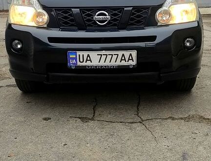 Черный Ниссан ИксТрейл, объемом двигателя 2 л и пробегом 205 тыс. км за 7800 $, фото 1 на Automoto.ua