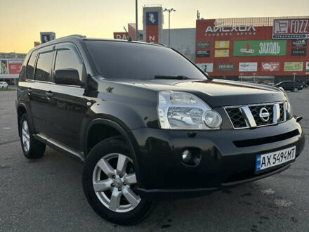 Черный Ниссан ИксТрейл, объемом двигателя 2 л и пробегом 305 тыс. км за 10700 $, фото 1 на Automoto.ua