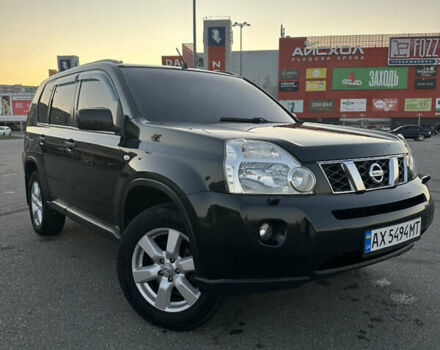Черный Ниссан ИксТрейл, объемом двигателя 2 л и пробегом 305 тыс. км за 10700 $, фото 1 на Automoto.ua