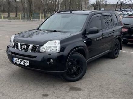 Черный Ниссан ИксТрейл, объемом двигателя 2 л и пробегом 280 тыс. км за 9500 $, фото 1 на Automoto.ua
