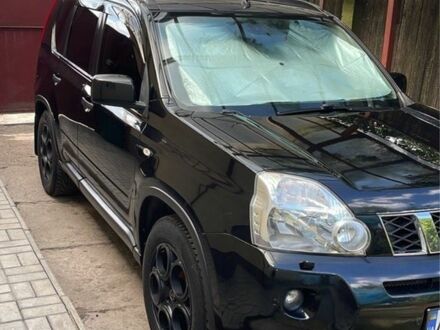 Черный Ниссан ИксТрейл, объемом двигателя 2 л и пробегом 280 тыс. км за 9500 $, фото 1 на Automoto.ua