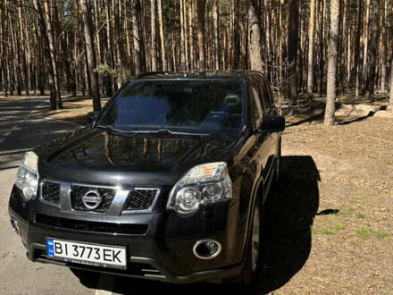 Черный Ниссан ИксТрейл, объемом двигателя 2 л и пробегом 226 тыс. км за 13000 $, фото 1 на Automoto.ua