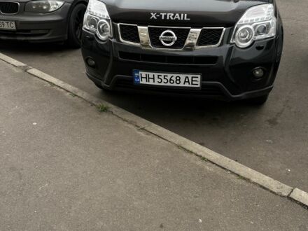 Черный Ниссан ИксТрейл, объемом двигателя 2 л и пробегом 135 тыс. км за 12800 $, фото 1 на Automoto.ua