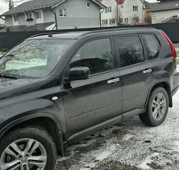 Черный Ниссан ИксТрейл, объемом двигателя 2 л и пробегом 200 тыс. км за 10500 $, фото 1 на Automoto.ua
