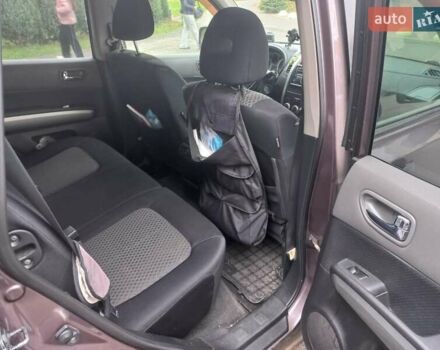 Фиолетовый Ниссан ИксТрейл, объемом двигателя 2 л и пробегом 265 тыс. км за 9200 $, фото 7 на Automoto.ua